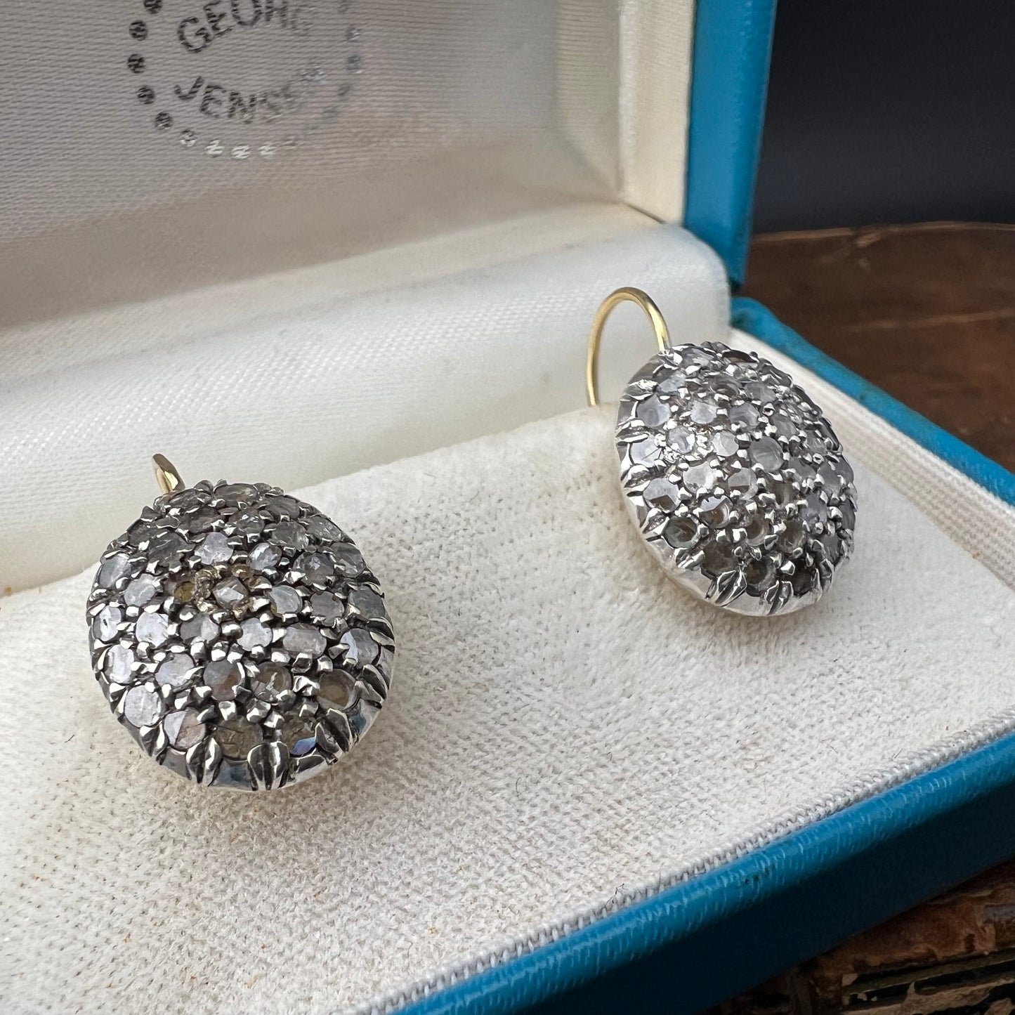 Pair of oval patch earrings, 18 ct gold, silver and diamond rosettes