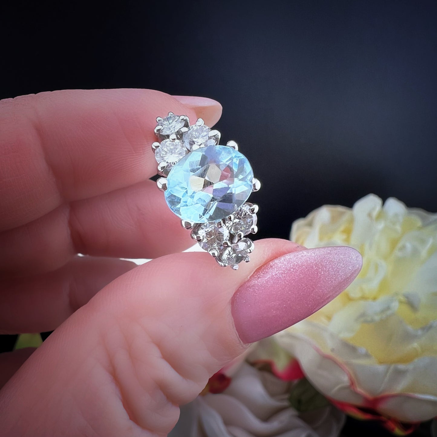 18k white gold ring with 1.20ct diamonds and 2.80ct blue topaz