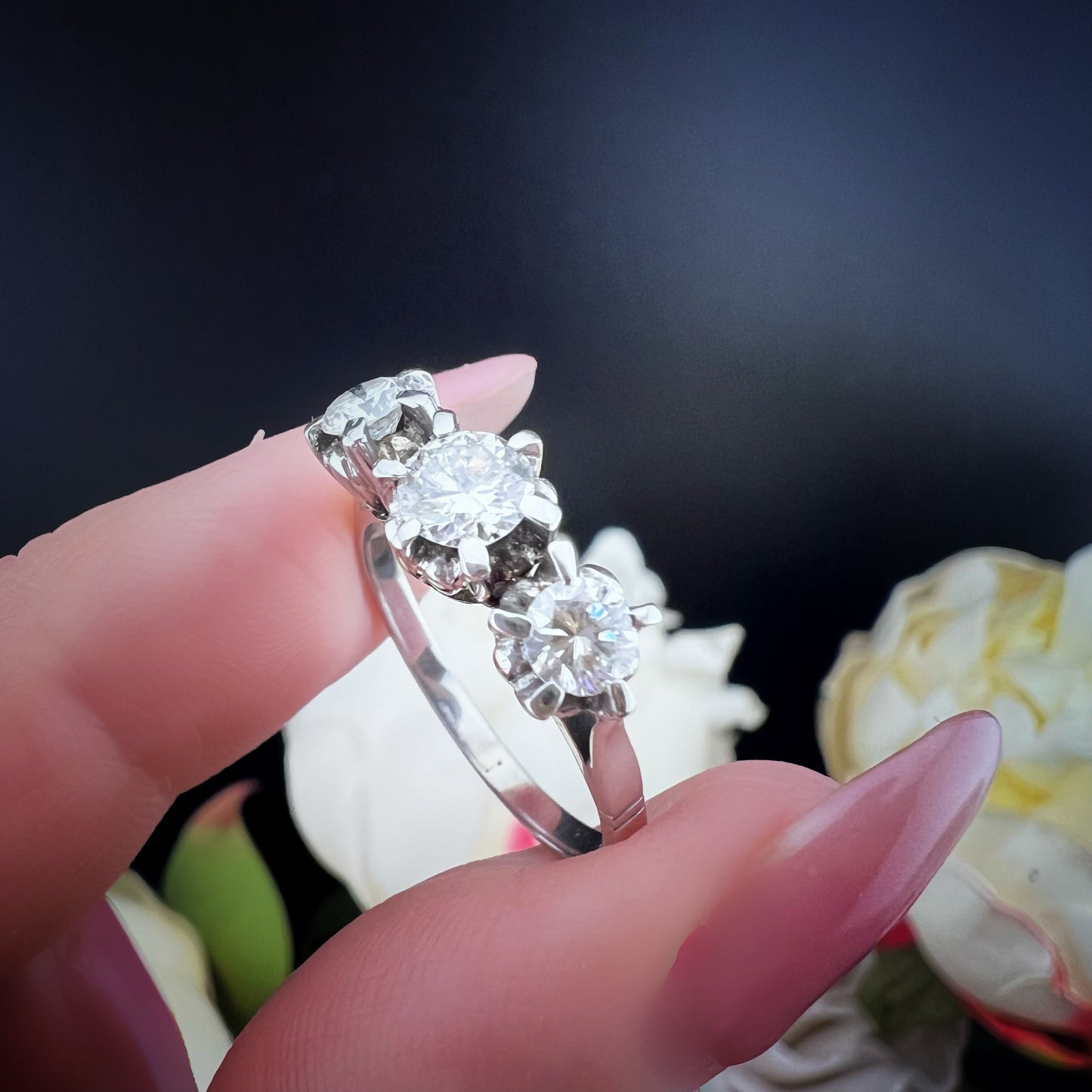 18K white gold and diamond trilogy ring. Italy, c. 1920.