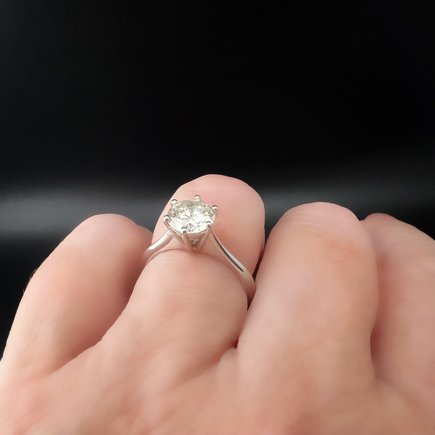 18K gold solitaire ring with 1.20 ct brilliant-cut diamond