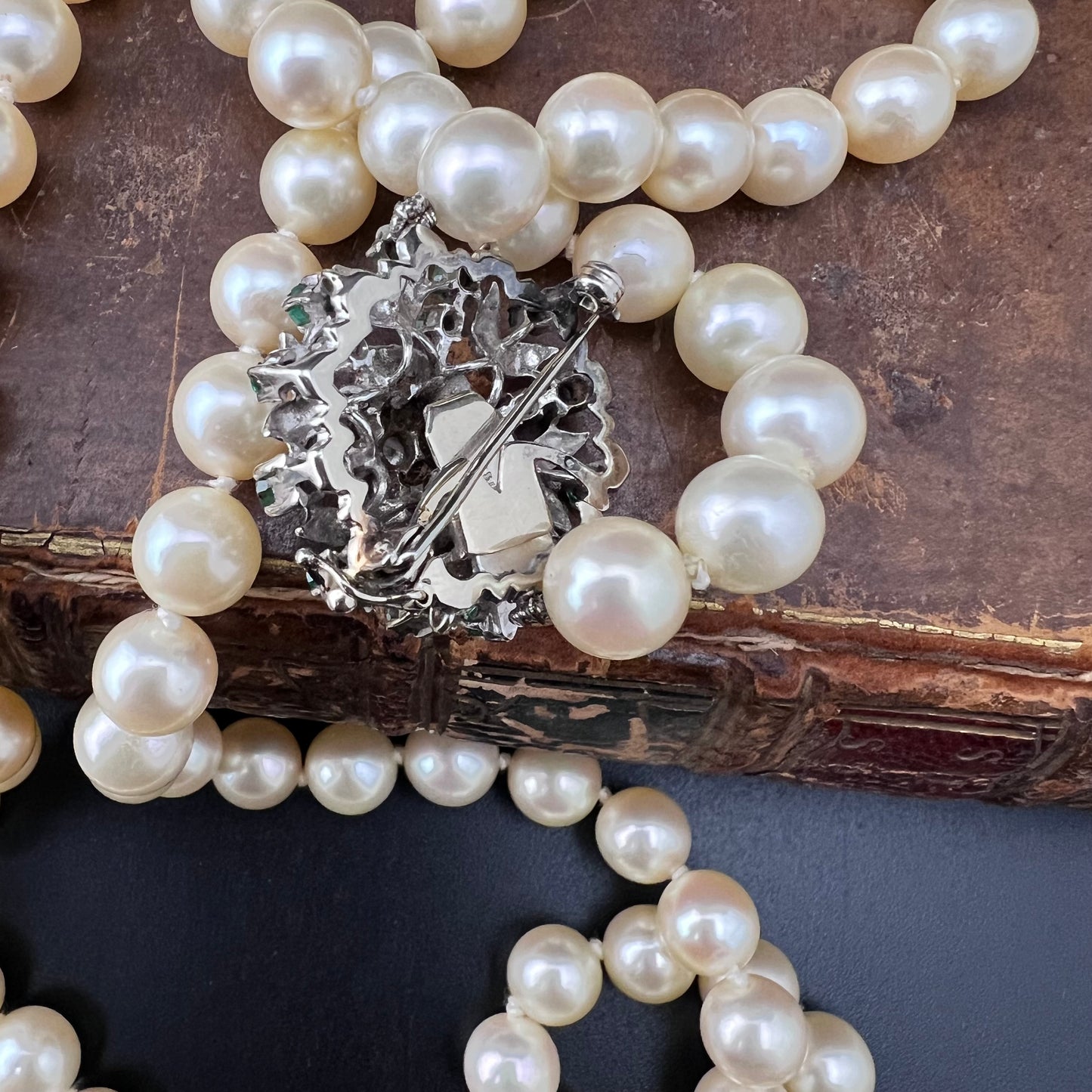 Pearl necklace, 82.5 cm, large 18 ct white gold clasp, emeralds, diamonds