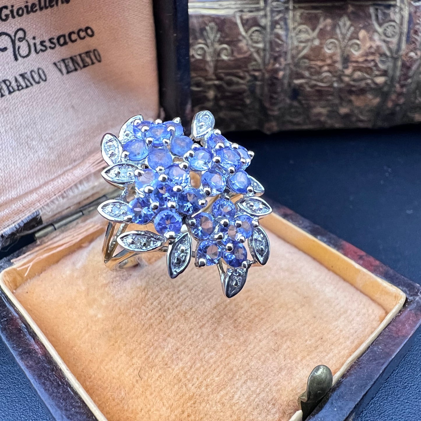 Cluster ring with tanzanites and diamonds