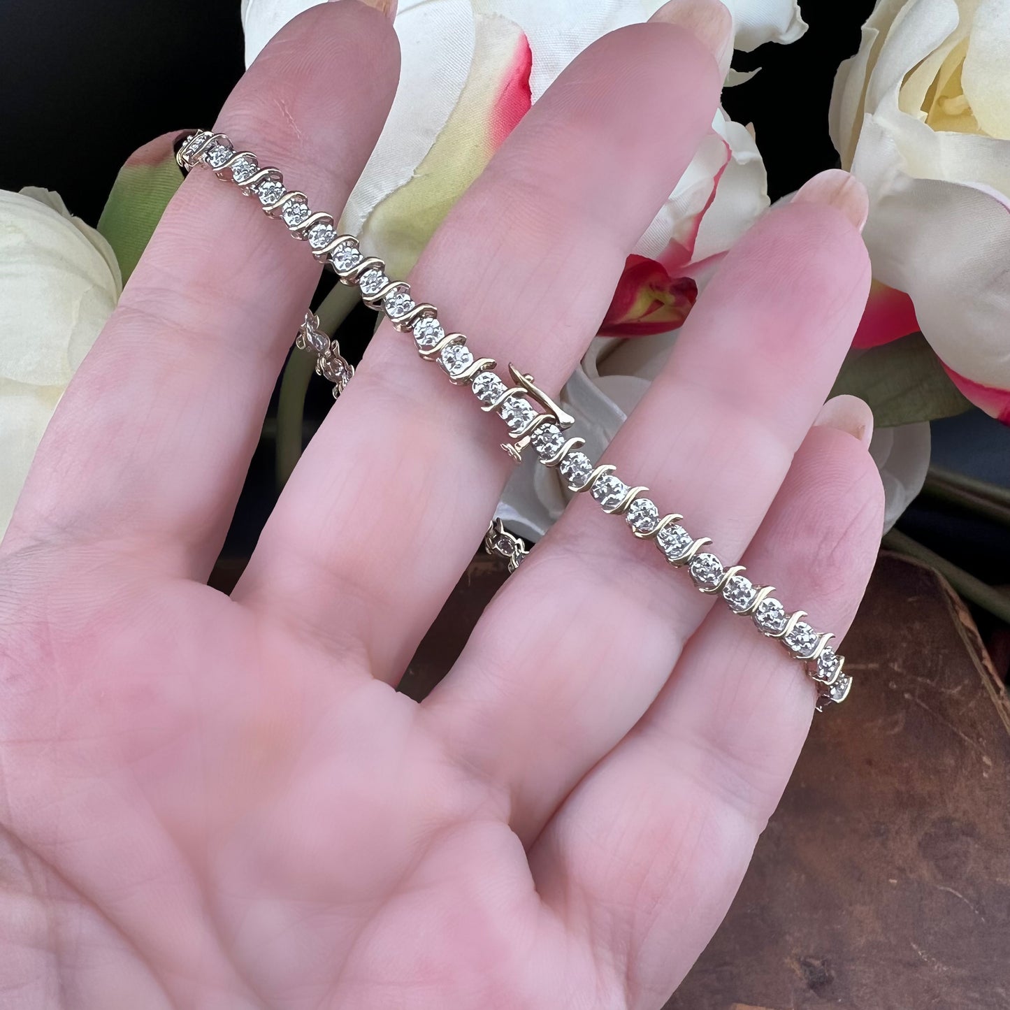 Bracciale tennis vintage in oro giallo e bianco e diamanti