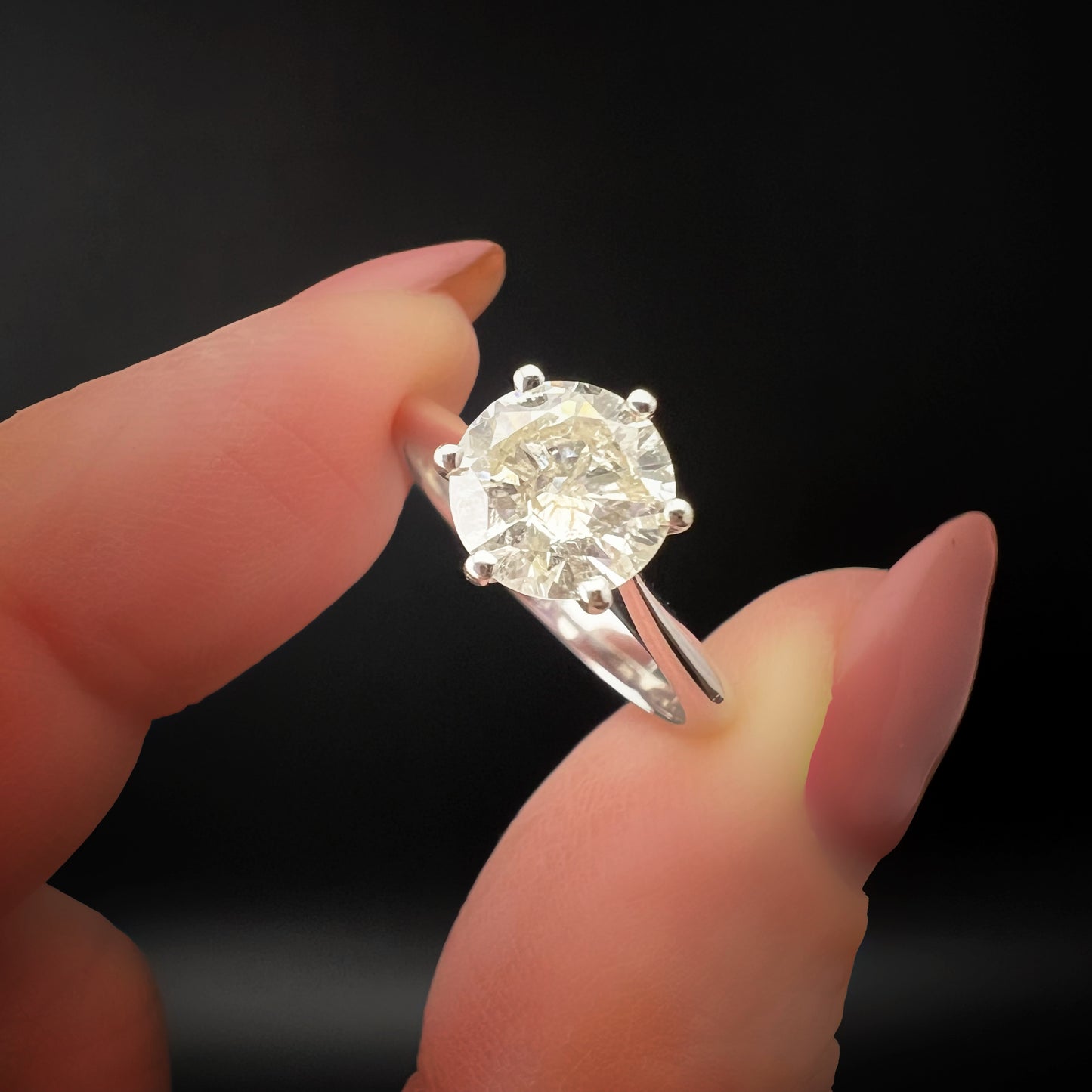 18K gold solitaire ring with 1.20 ct brilliant-cut diamond