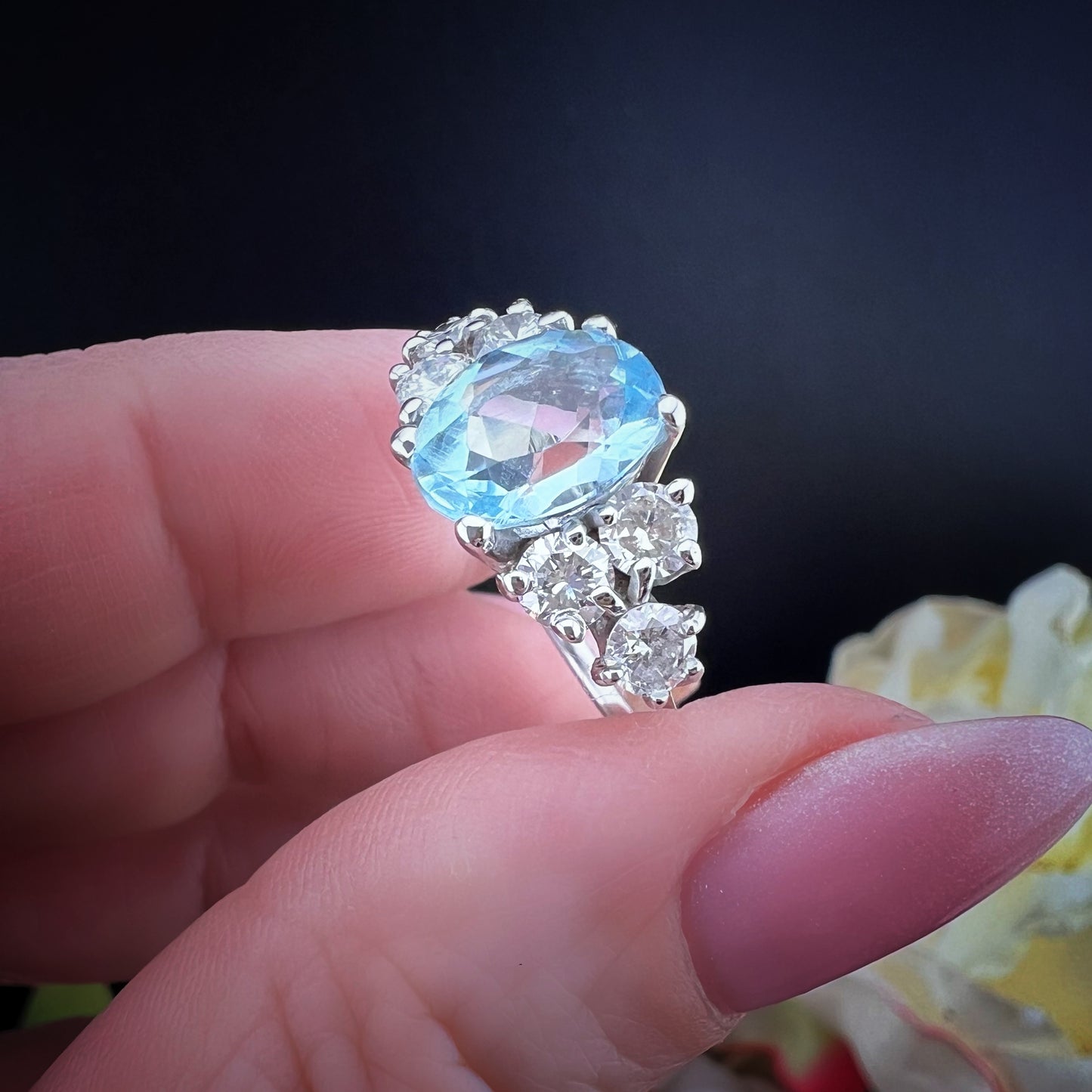 18k white gold ring with 1.20ct diamonds and 2.80ct blue topaz