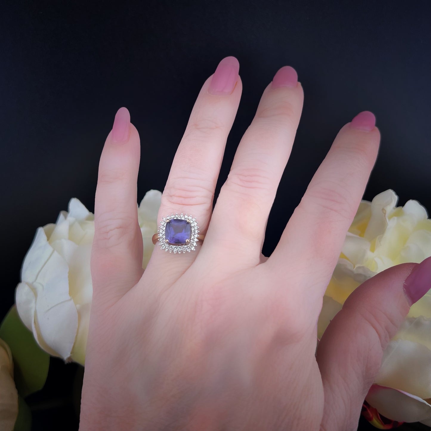 Cushion amethyst and diamond ring