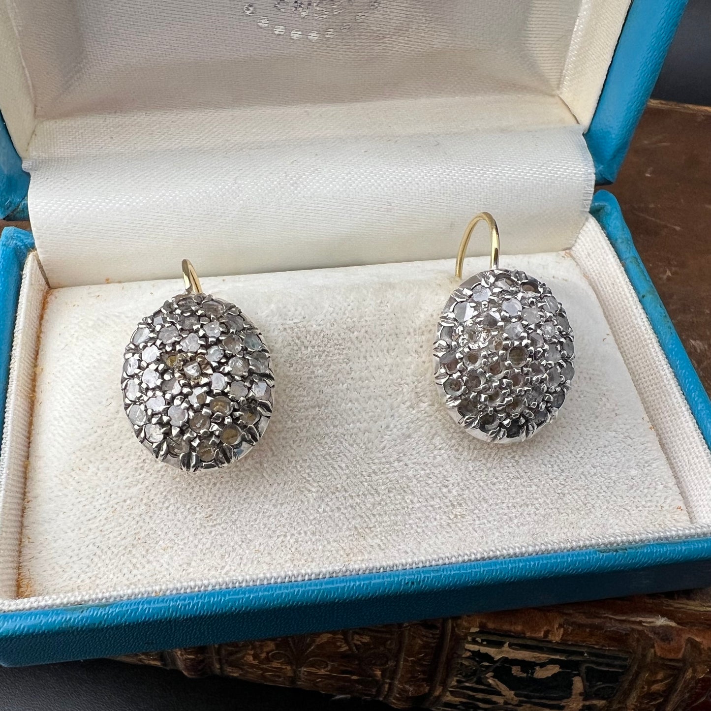 Pair of oval patch earrings, 18 ct gold, silver and diamond rosettes