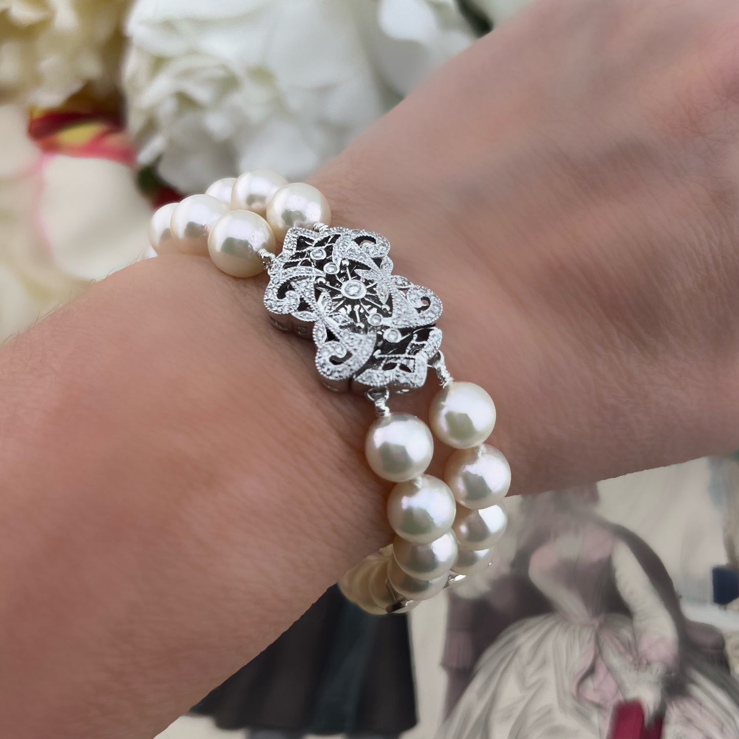 Bracciale vintage in perle Akoya con chiusura importante in oro bianco e diamanti – Anni ’60