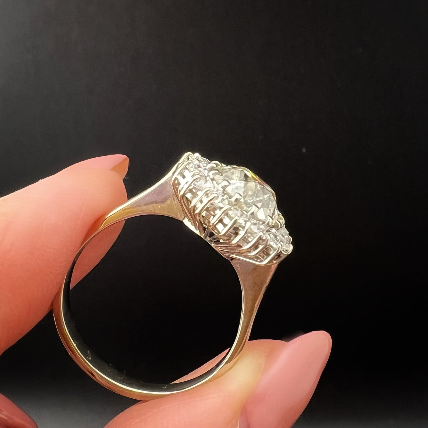 Ring with 4 ct old mine cut diamond plus 1 ct surround