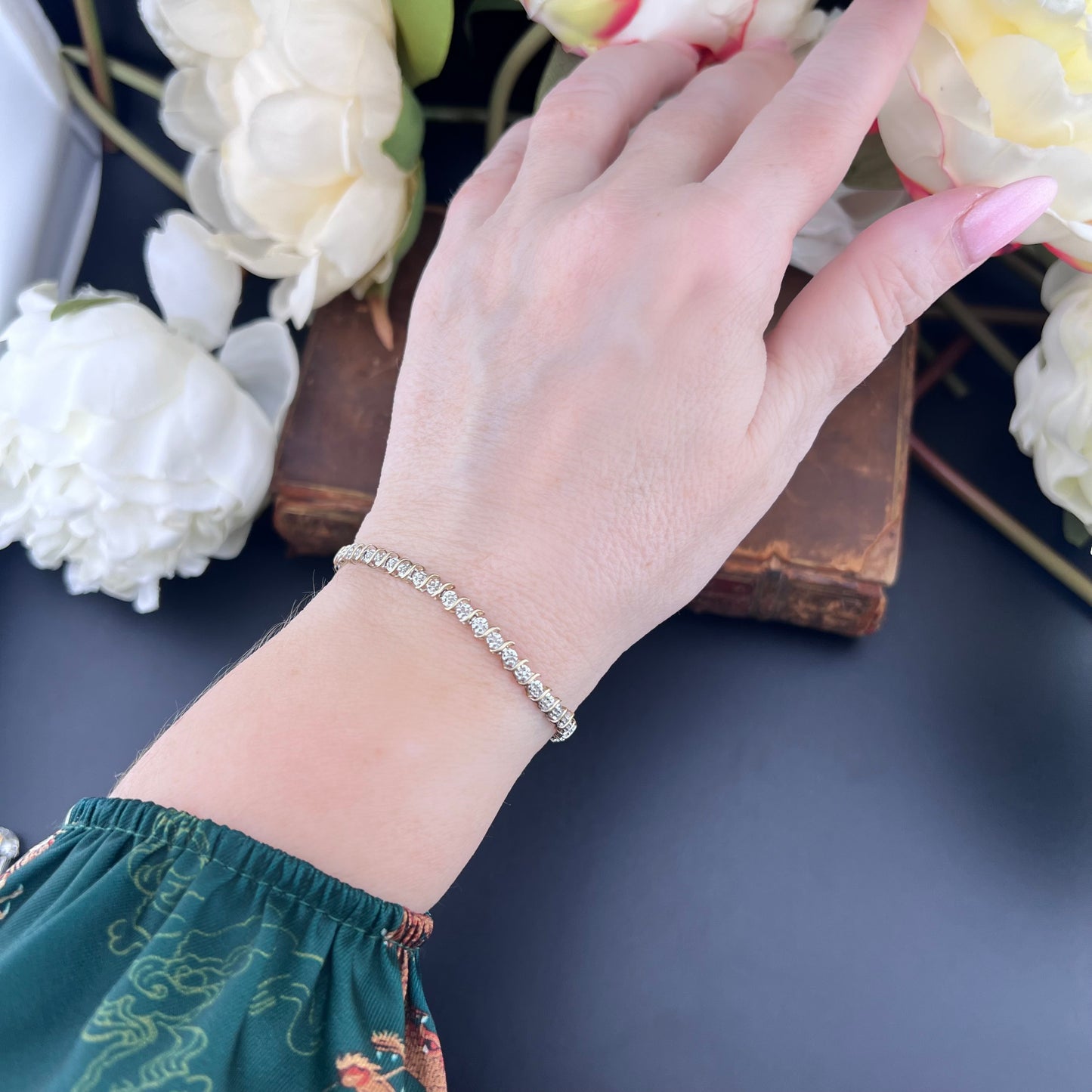 Bracciale tennis vintage in oro giallo e bianco e diamanti