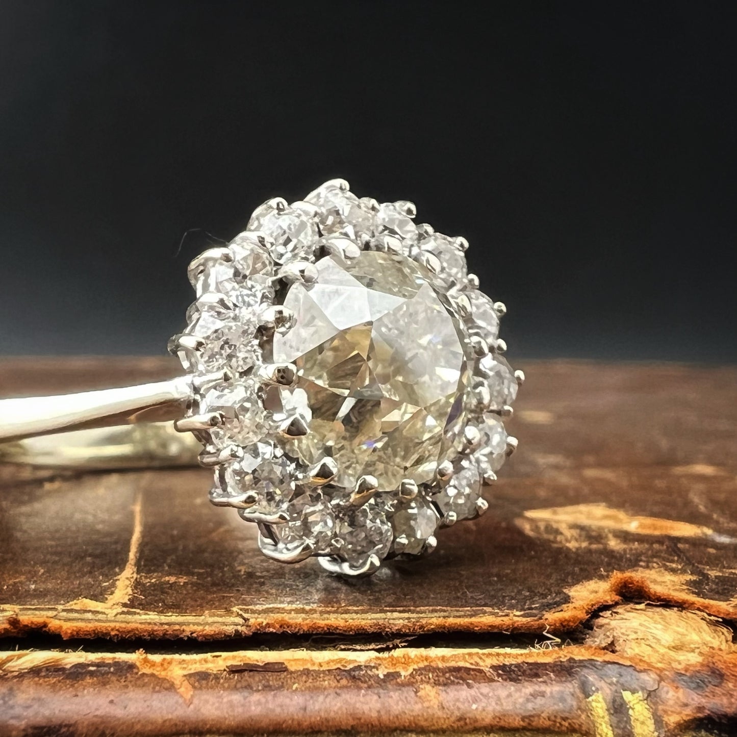 Ring with 4 ct old mine cut diamond plus 1 ct surround