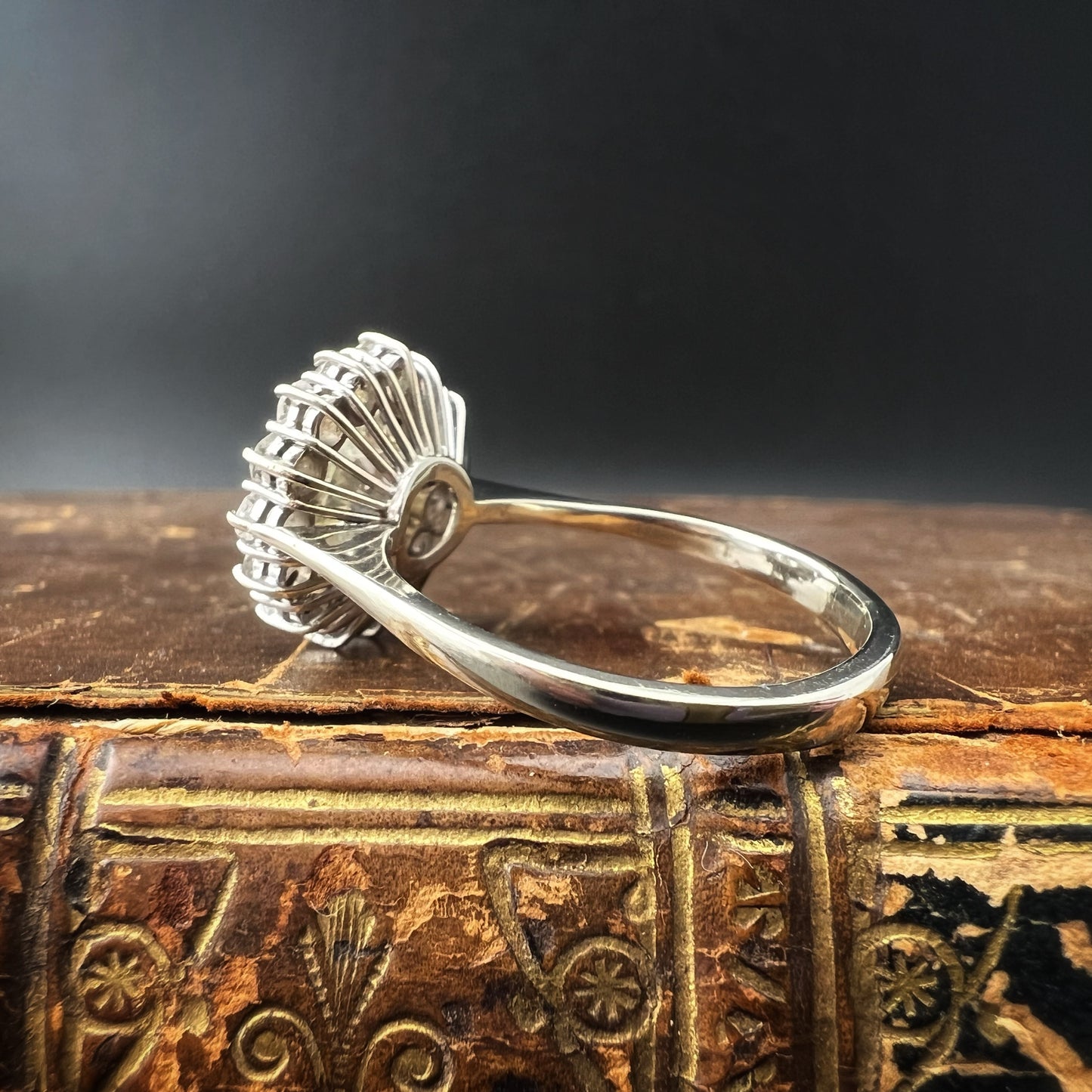 Ring with 4 ct old mine cut diamond plus 1 ct surround