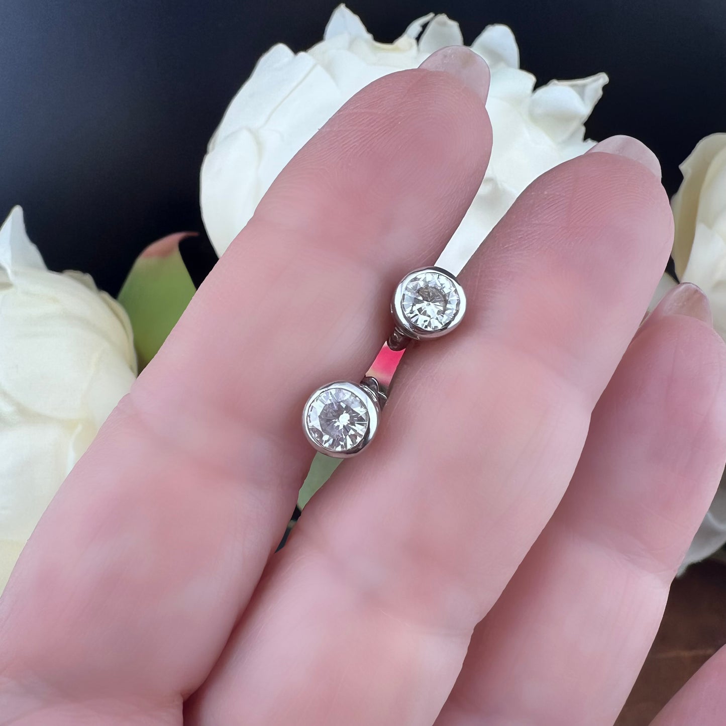 Orecchini vintage in oro bianco con diamanti da 0.60 ct ciascuno