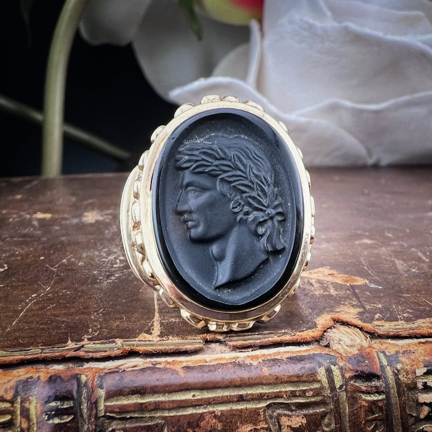 GOLD AND CARVED BASALT SIGNET RING – LONDON, 1972