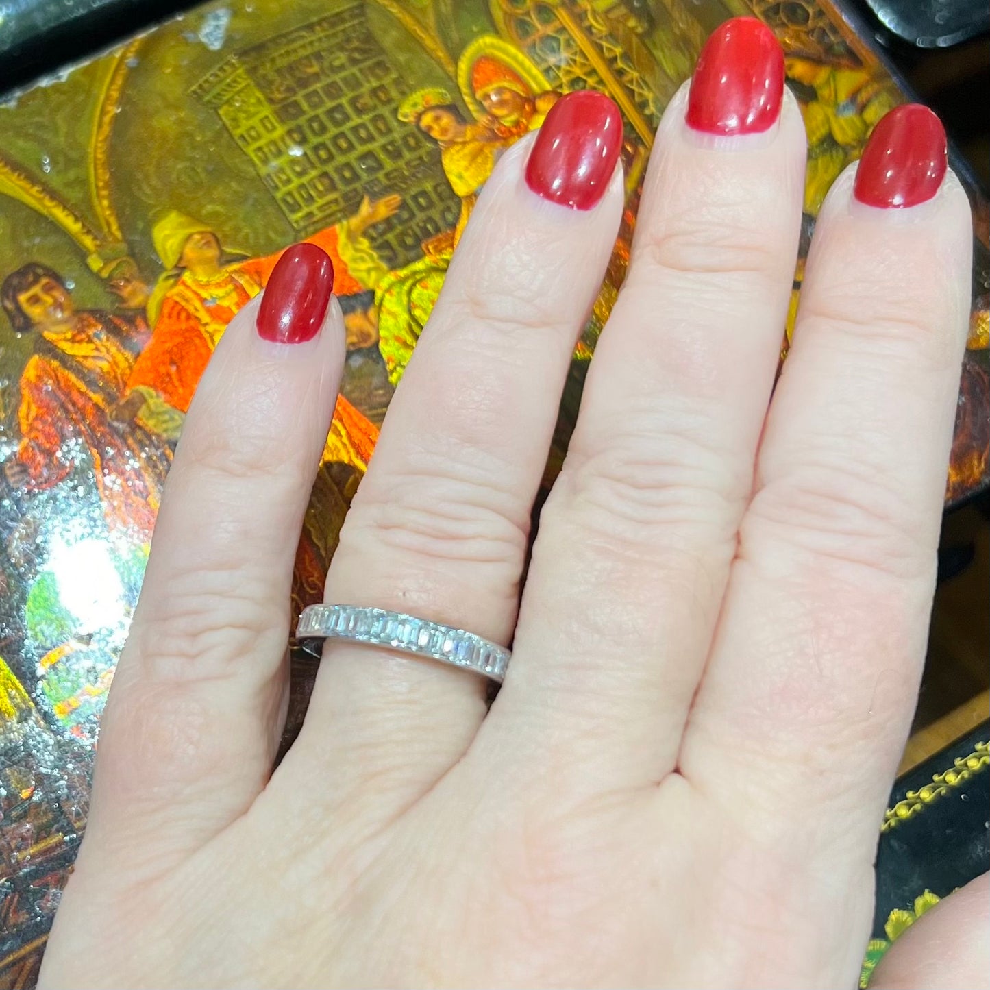 Eternity ring with emerald cut diamonds