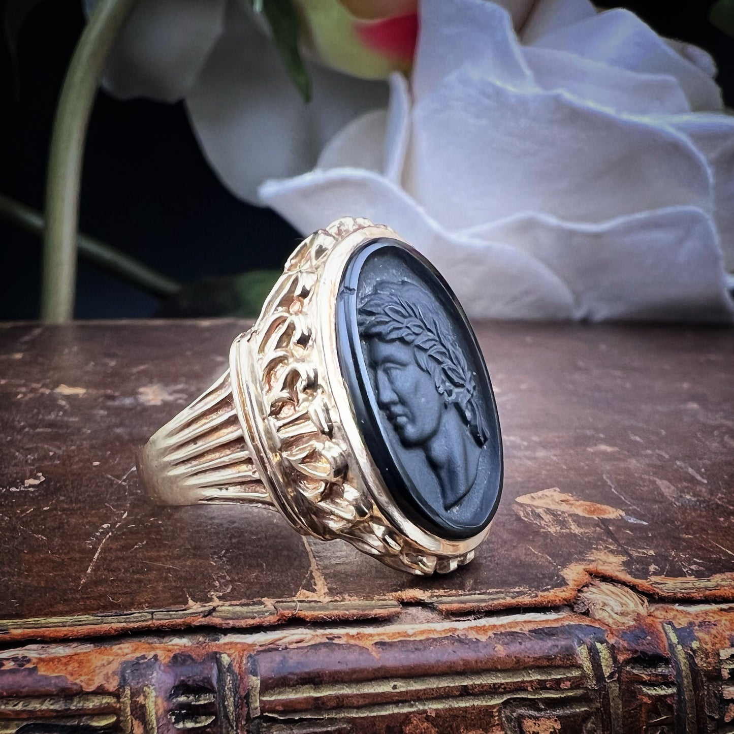 GOLD AND CARVED BASALT SIGNET RING – LONDON, 1972