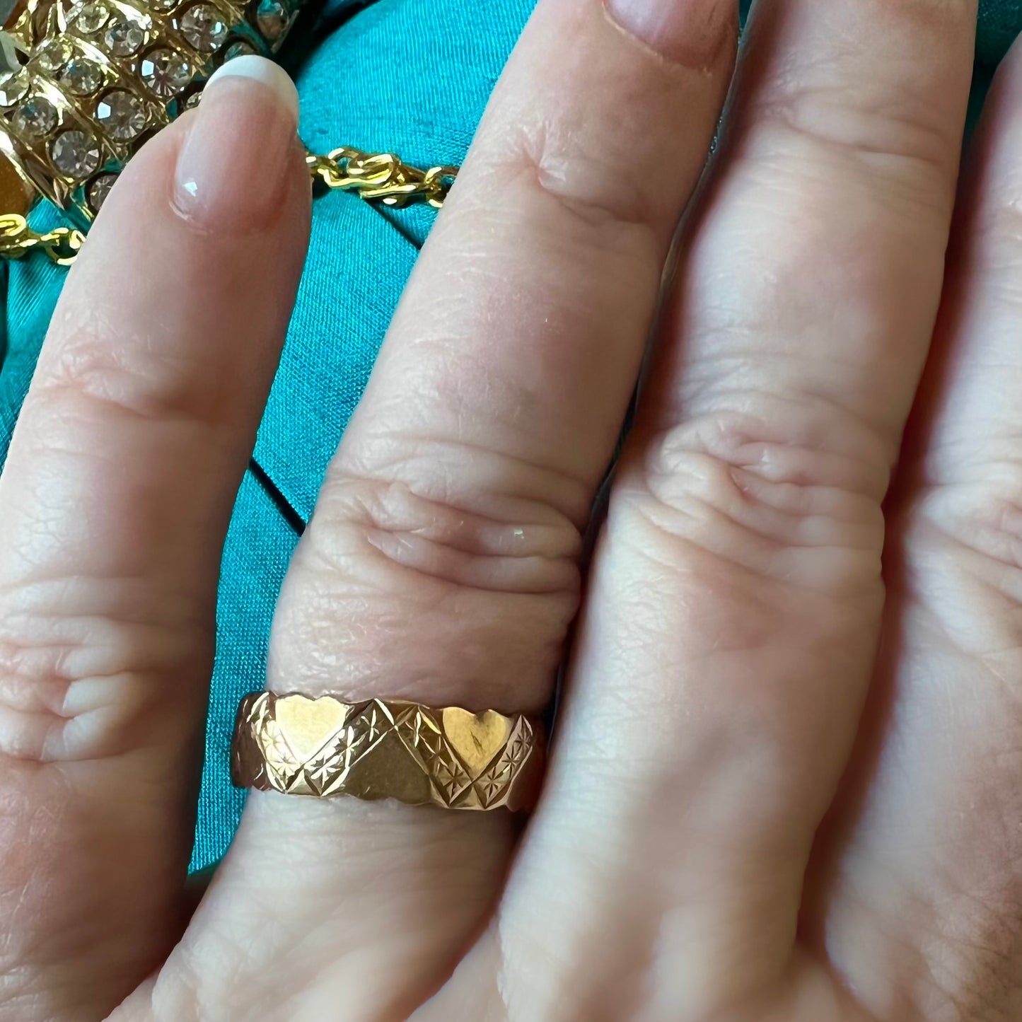 Band ring with hearts