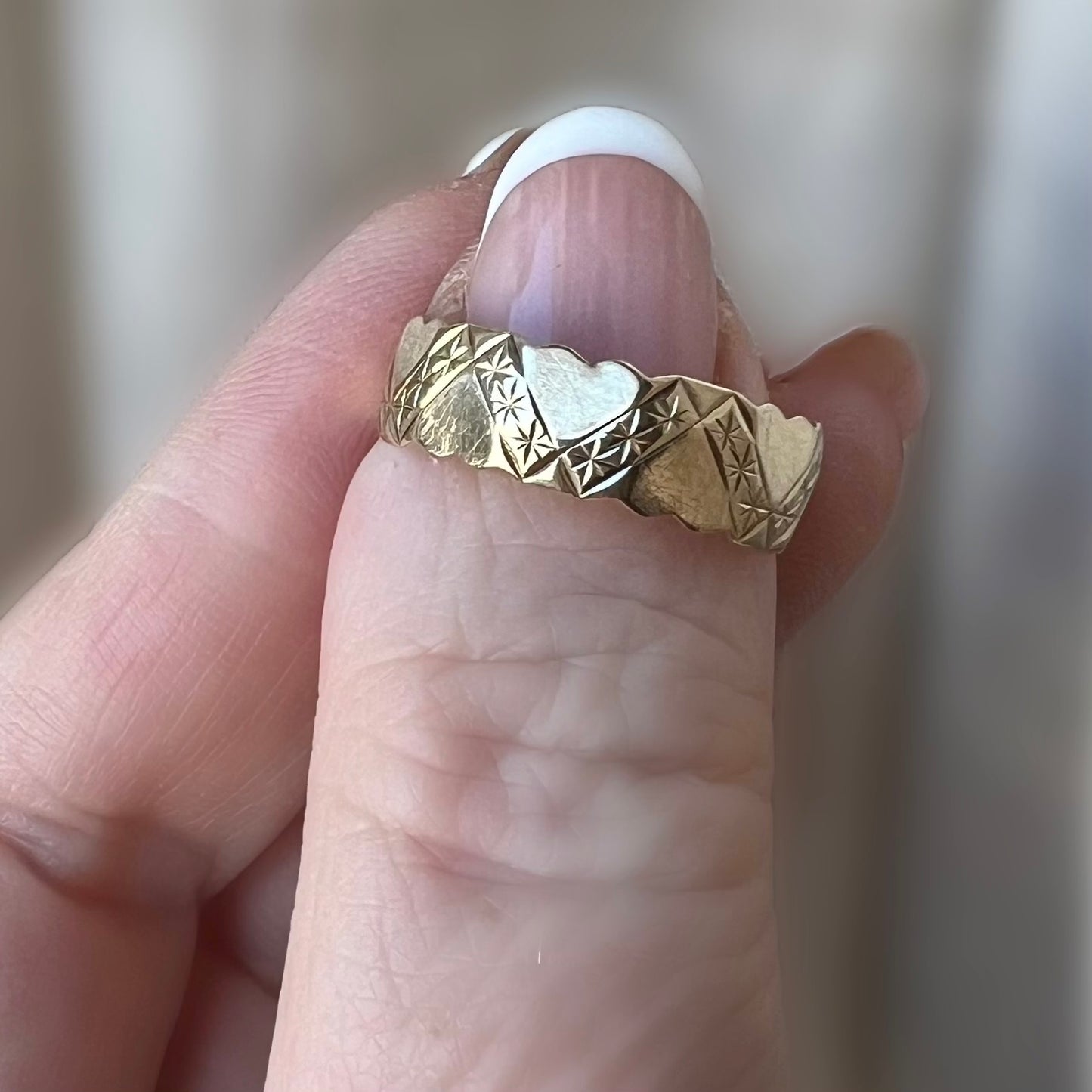 Band ring with hearts