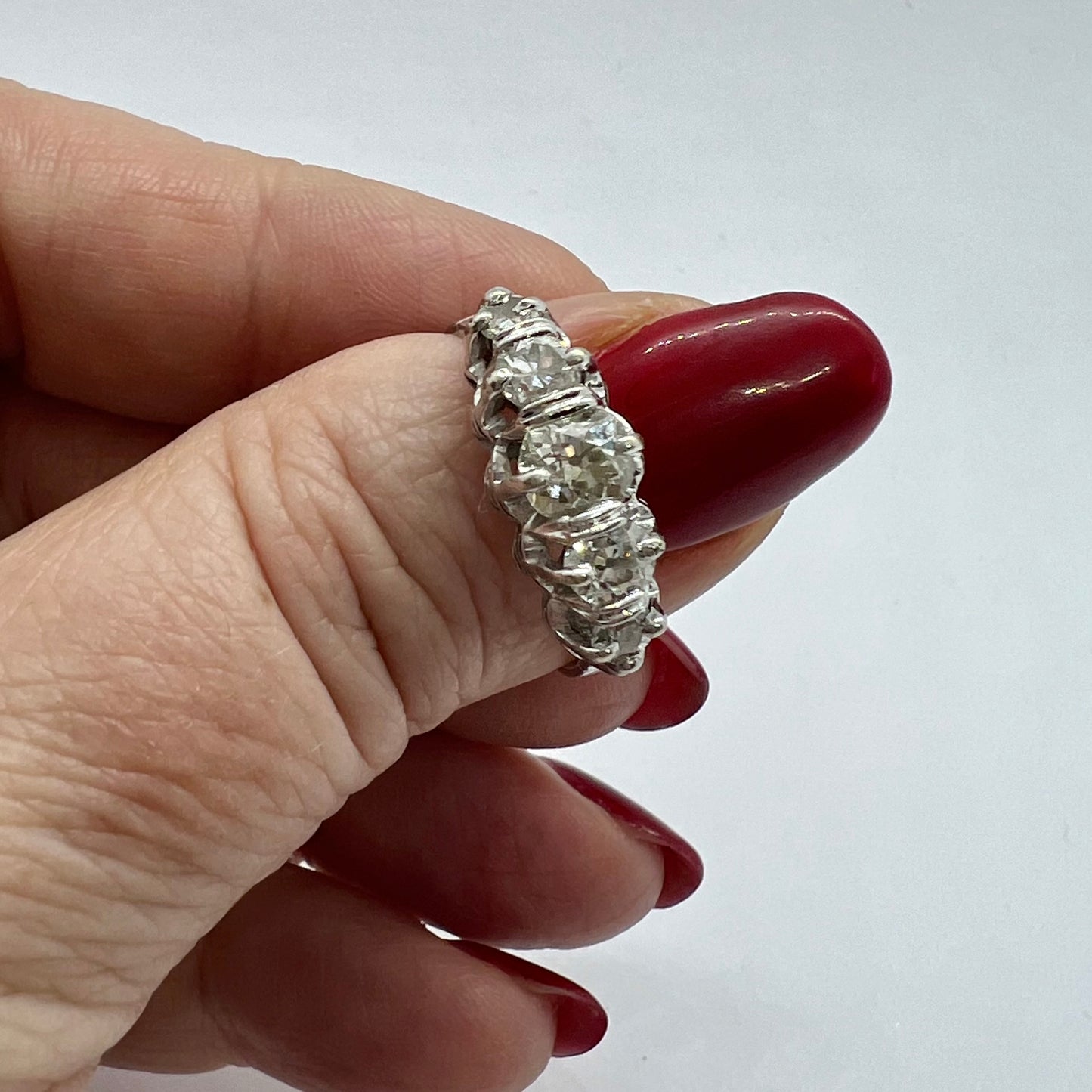 Wedding ring with five old mine diamonds, total estimated 1 ct