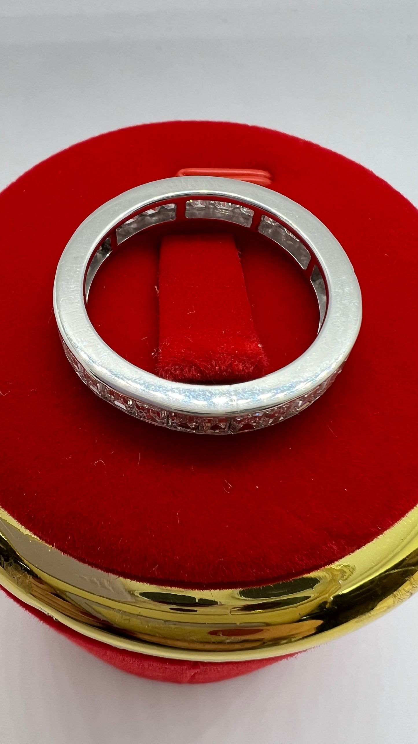 Eternity ring with emerald cut diamonds