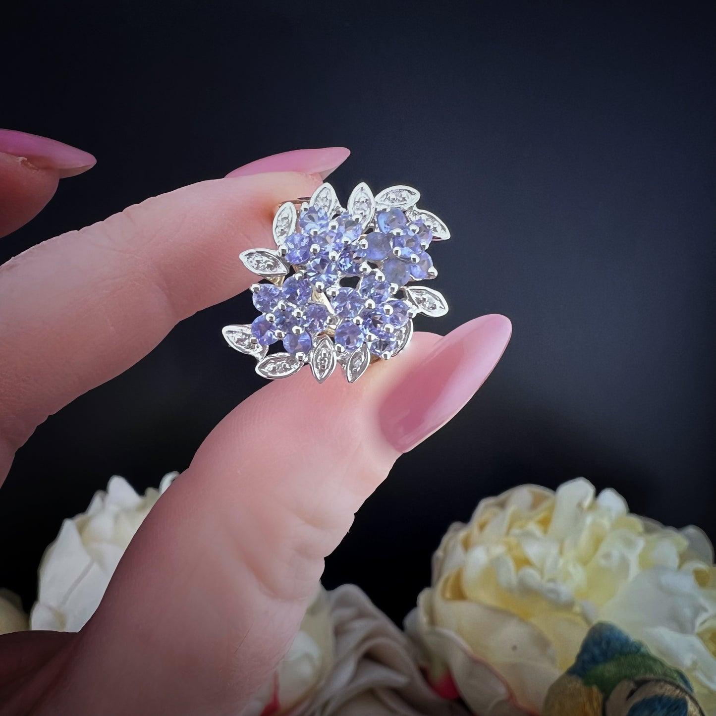 Cluster ring with tanzanites and diamonds