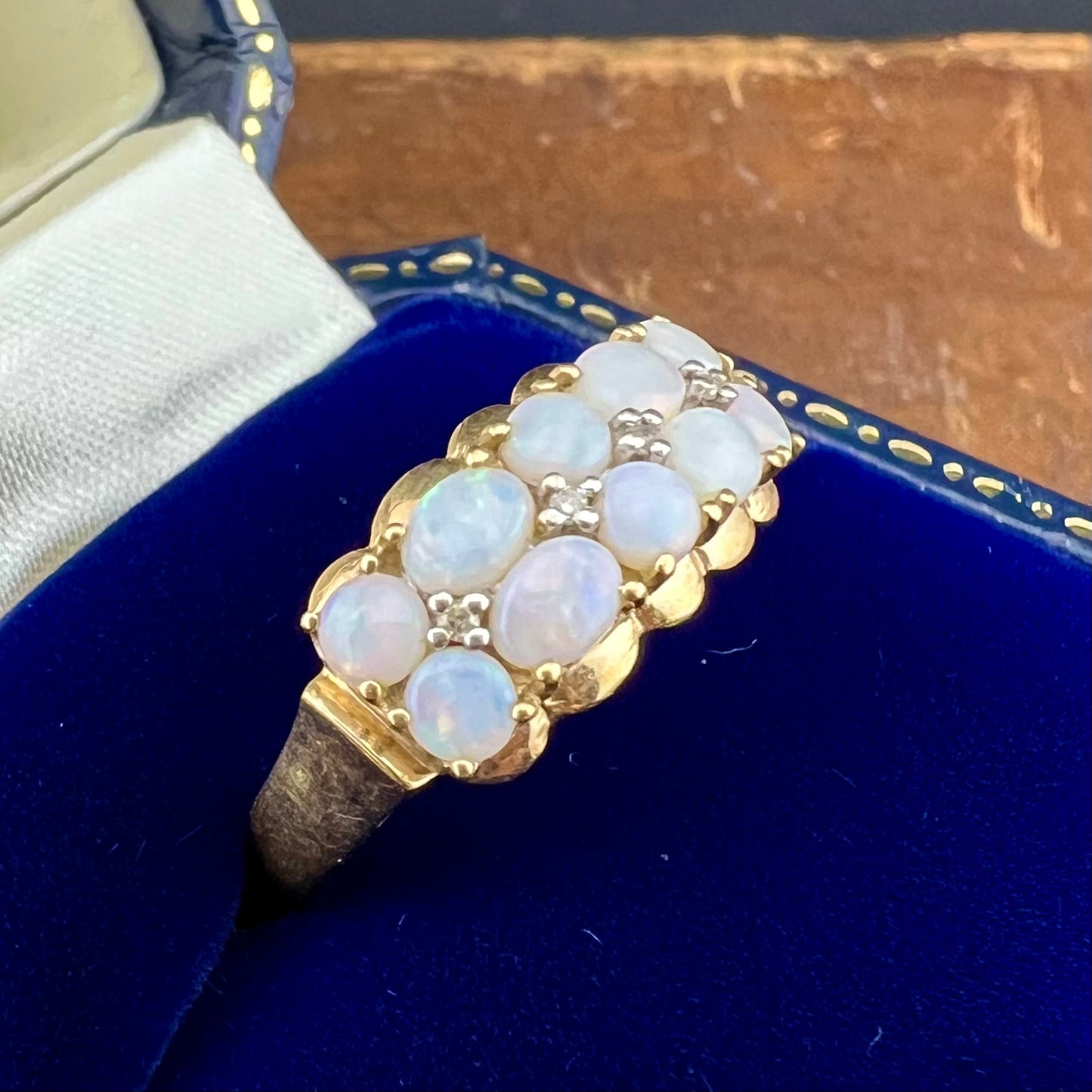 9ct yellow gold ring with opals and diamonds