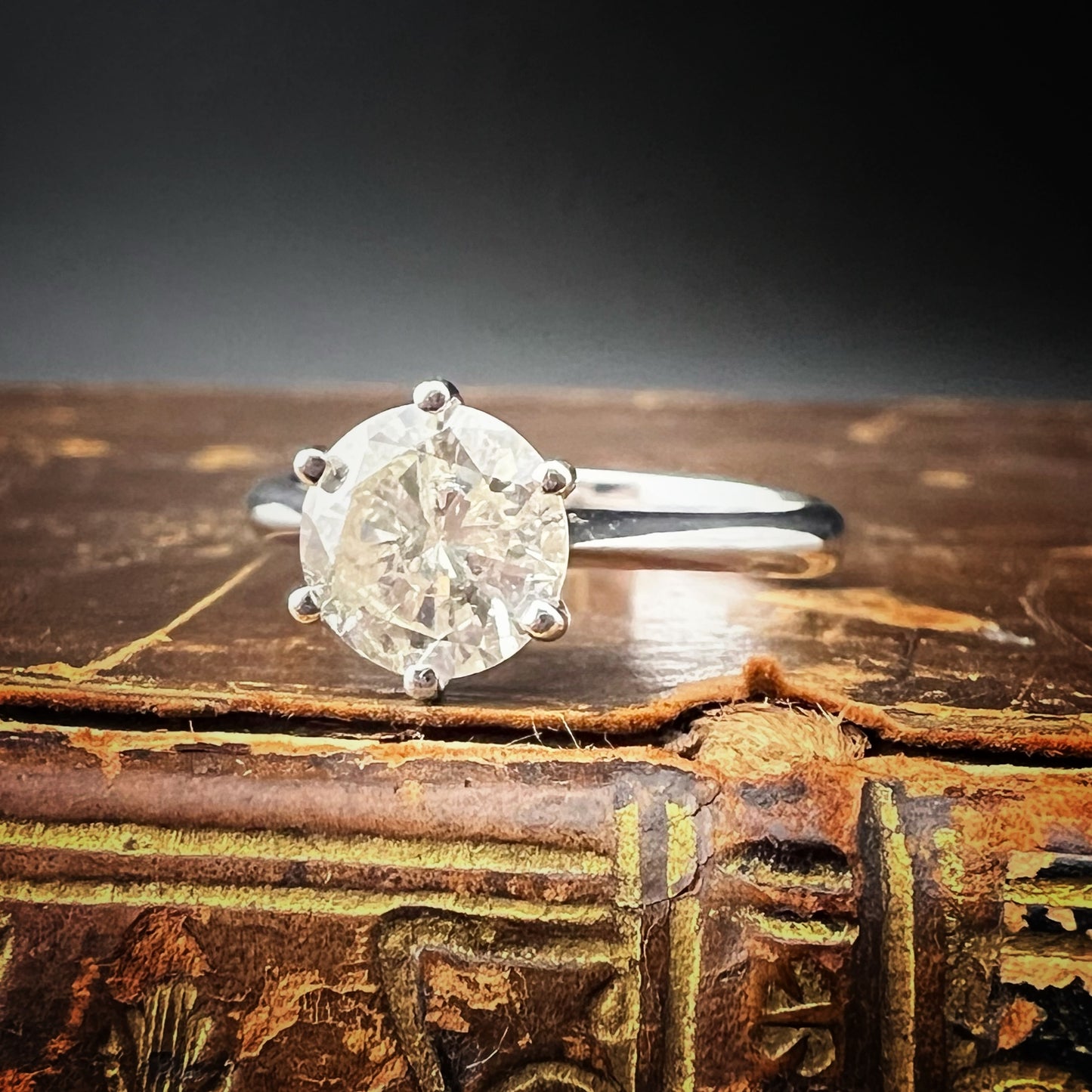 18K gold solitaire ring with 1.20 ct brilliant-cut diamond