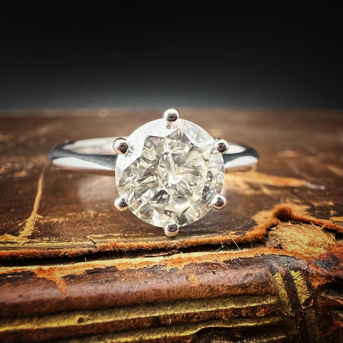 18K gold solitaire ring with 1.20 ct brilliant-cut diamond