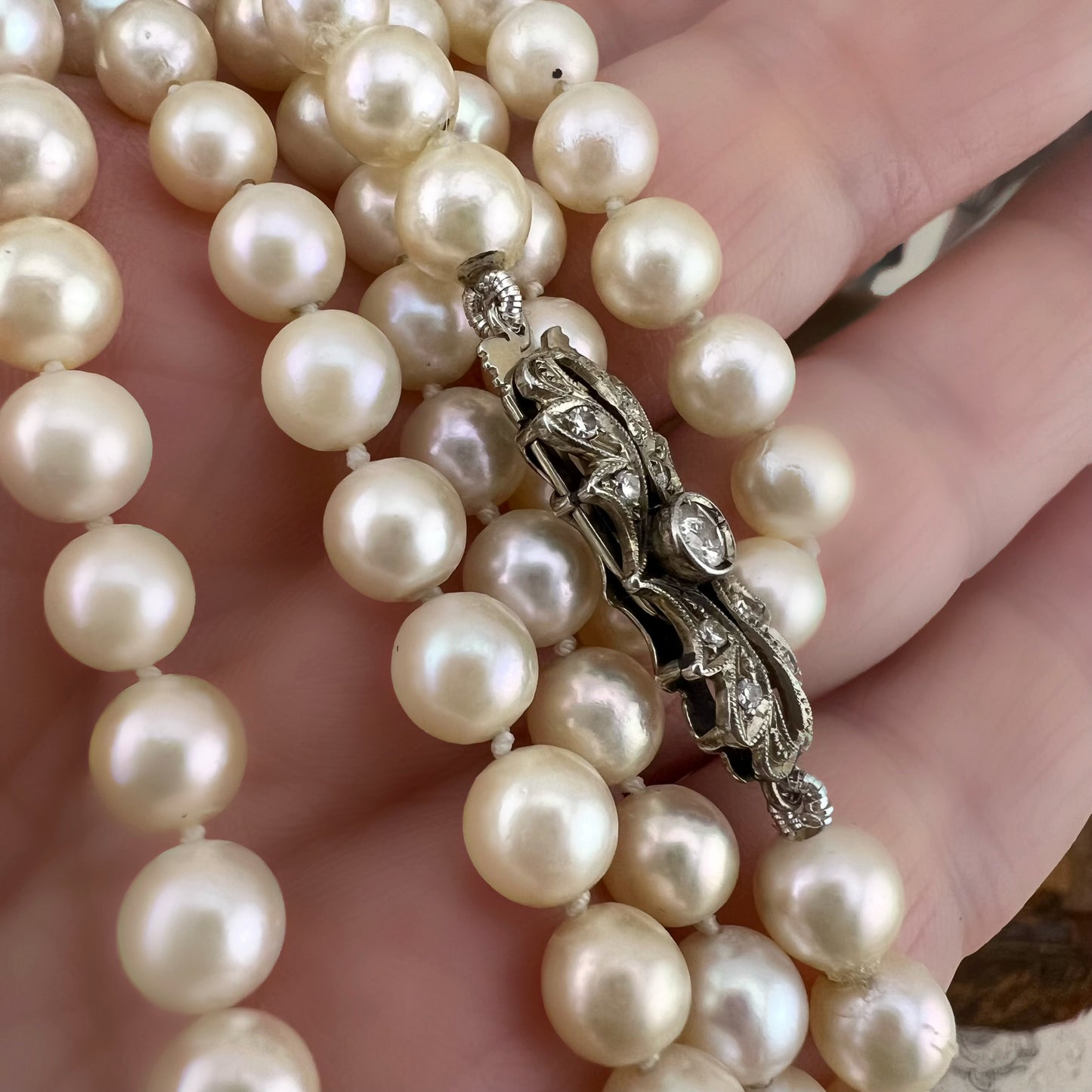 Collana 112 perle akoya, oro e diamanti