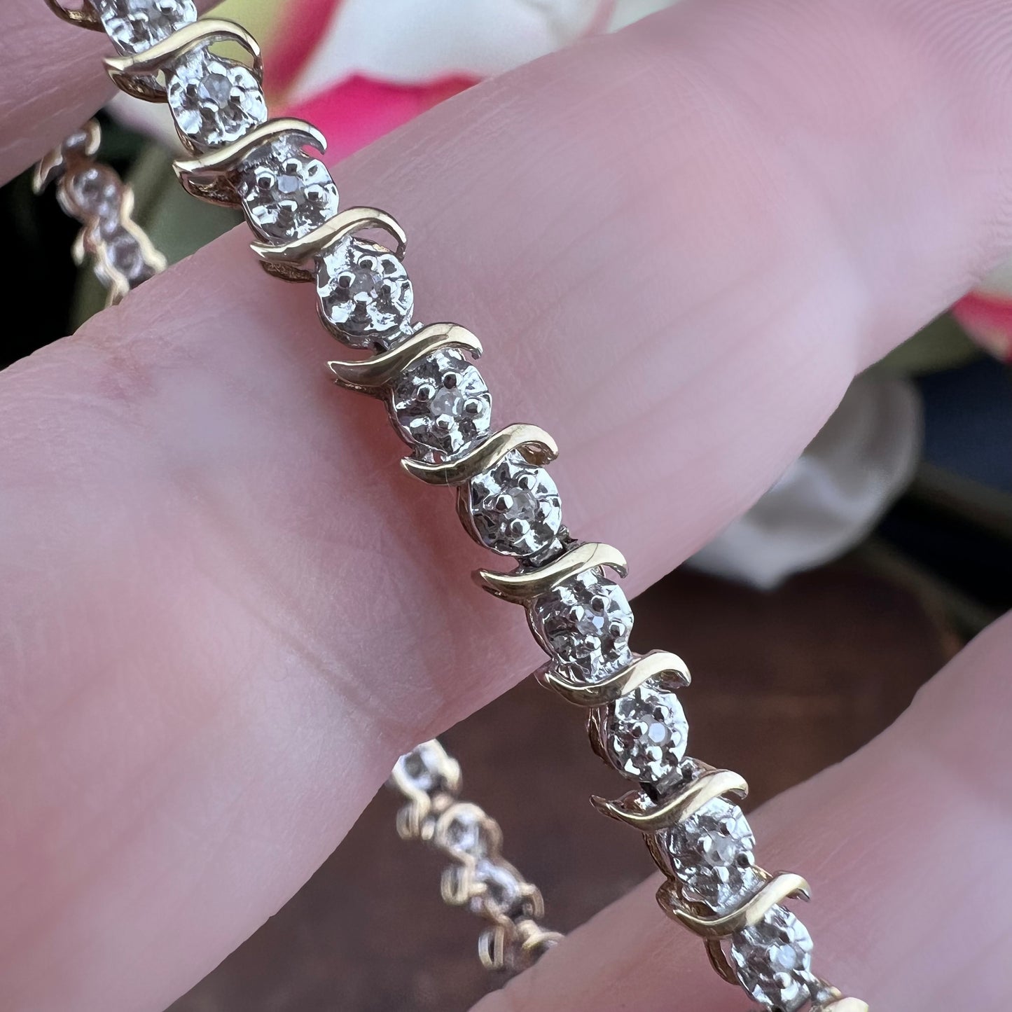 Bracciale tennis vintage in oro giallo e bianco e diamanti