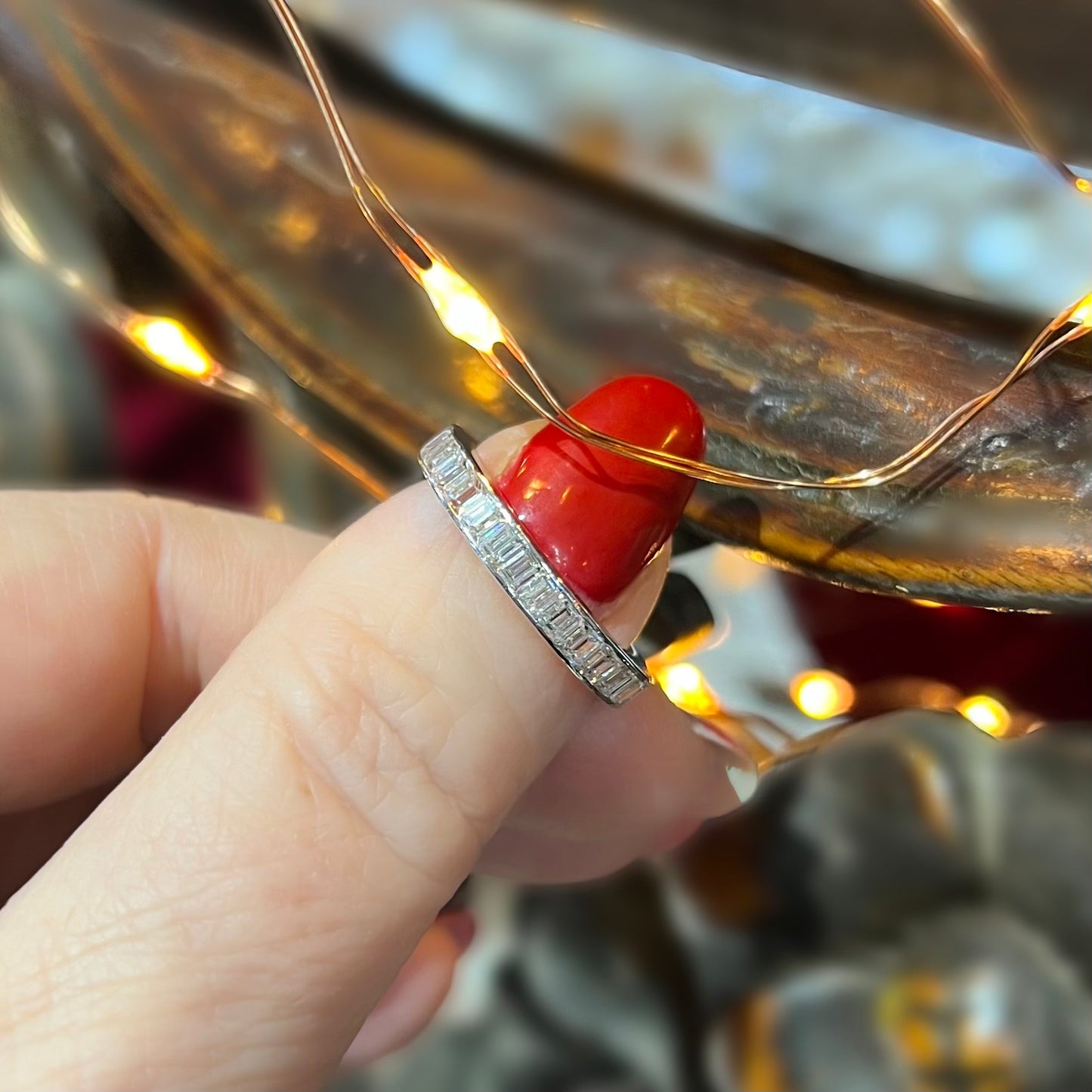 Eternity ring with emerald cut diamonds