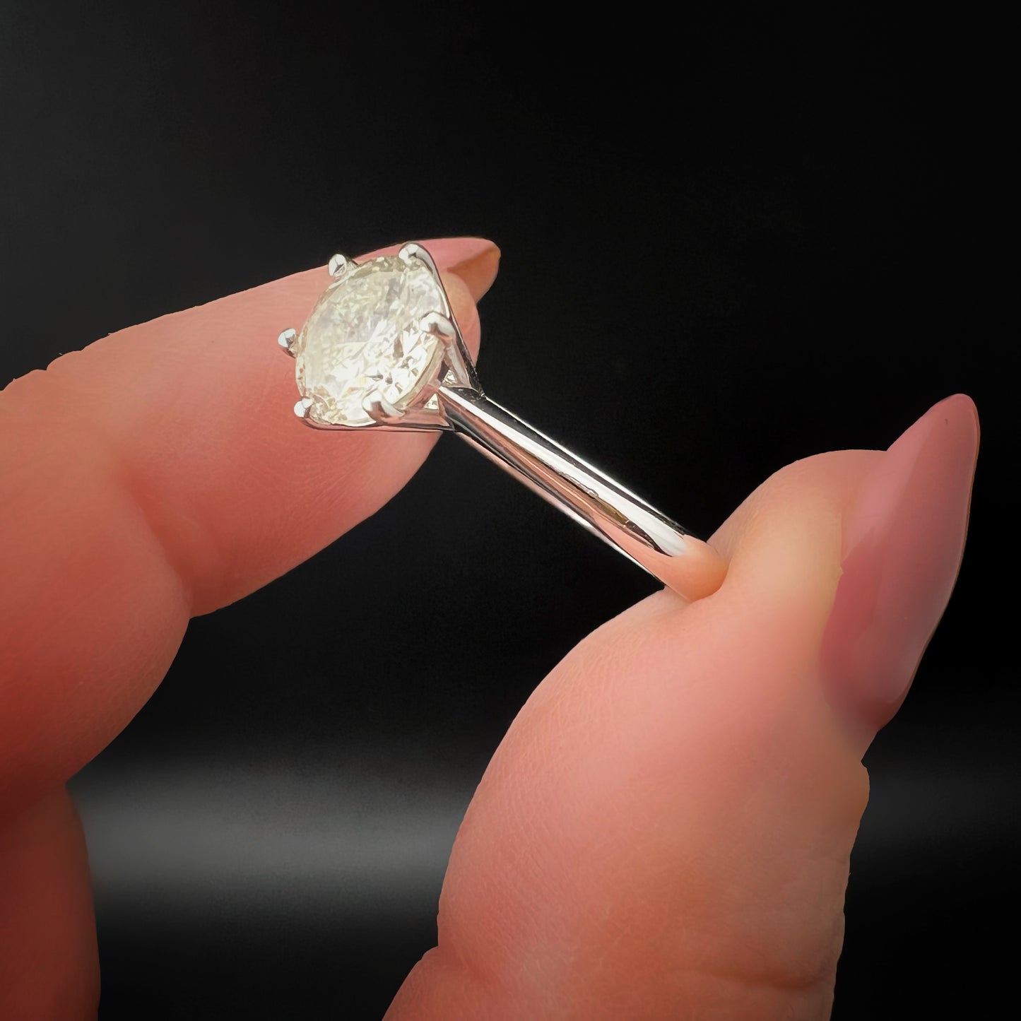 18K gold solitaire ring with 1.20 ct brilliant-cut diamond