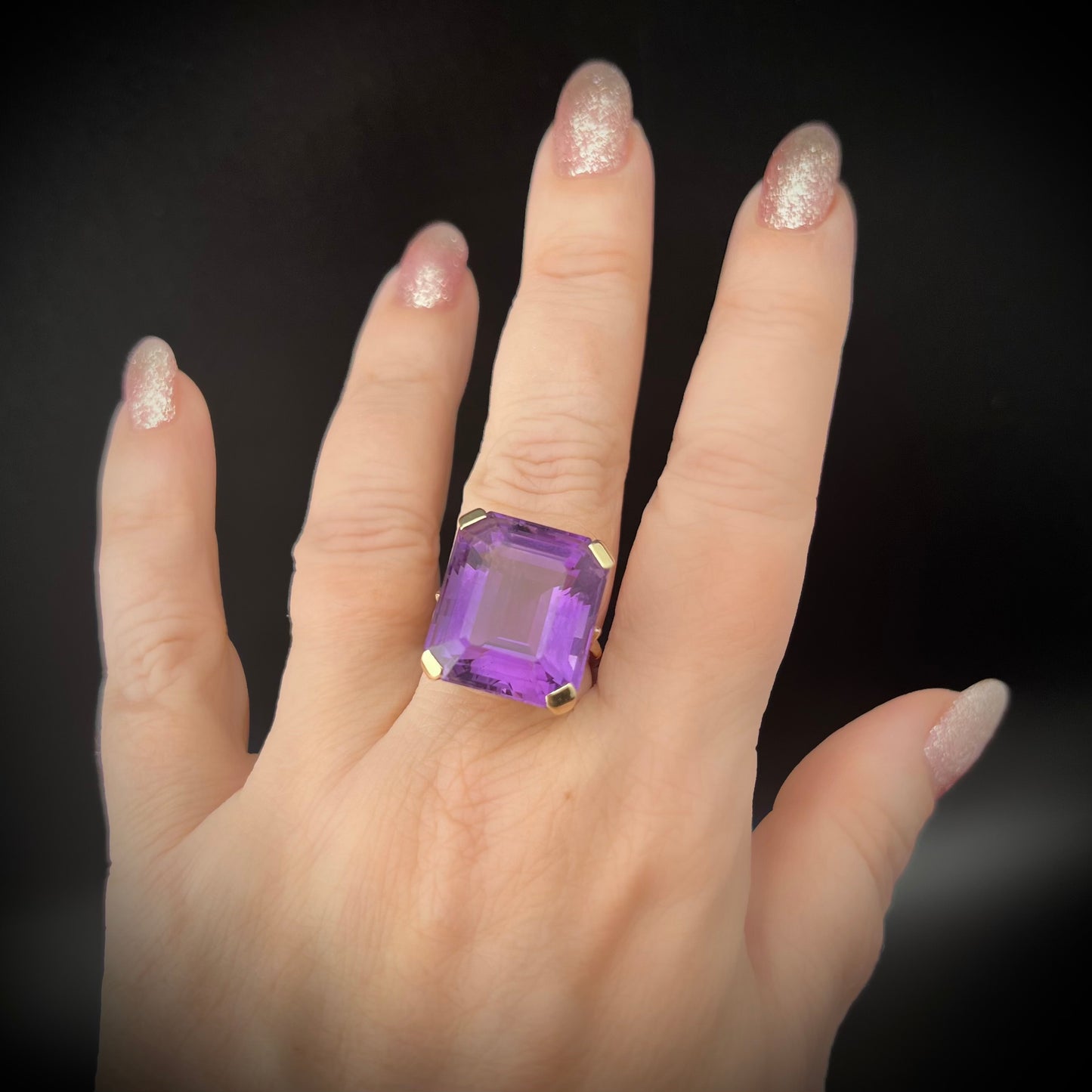 1960s gold cocktail ring with large 23.65 ct amethyst