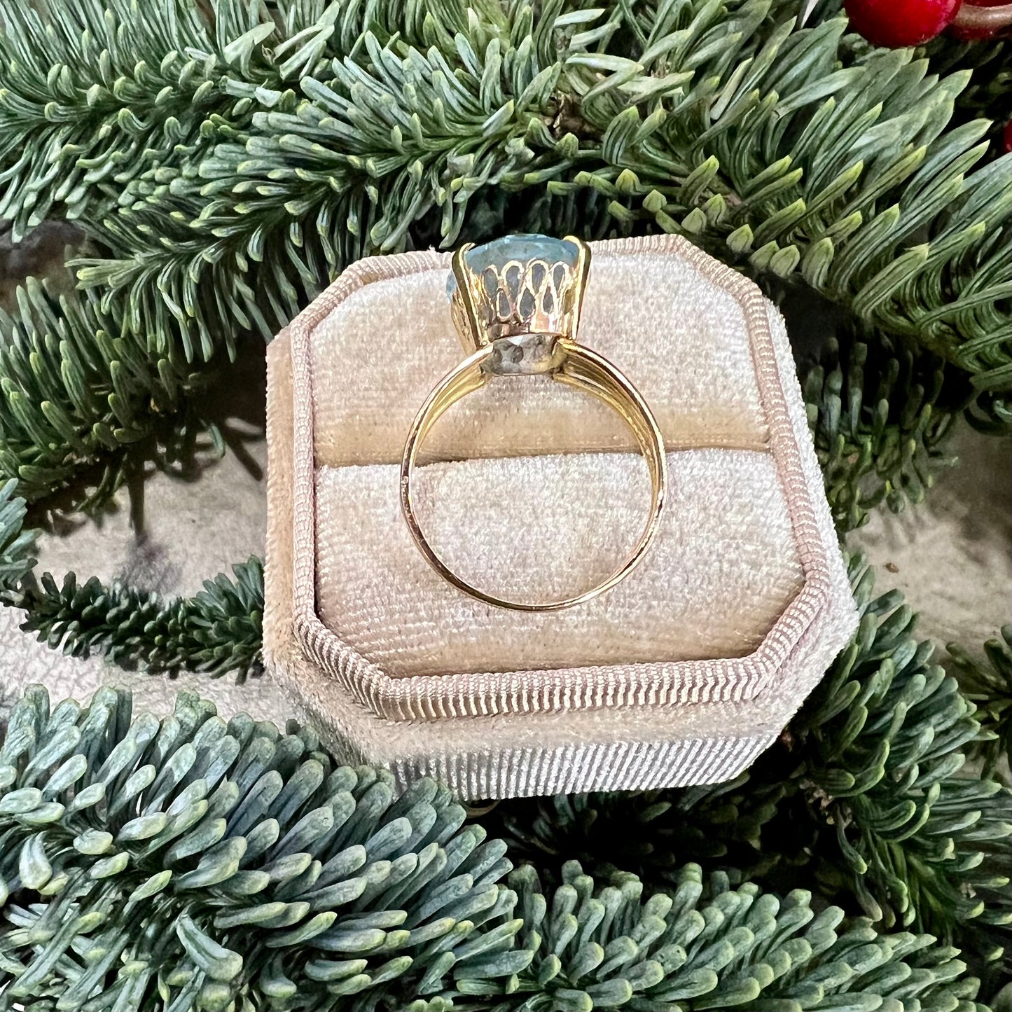 Cocktail ring with blue topaz and 14k yellow gold