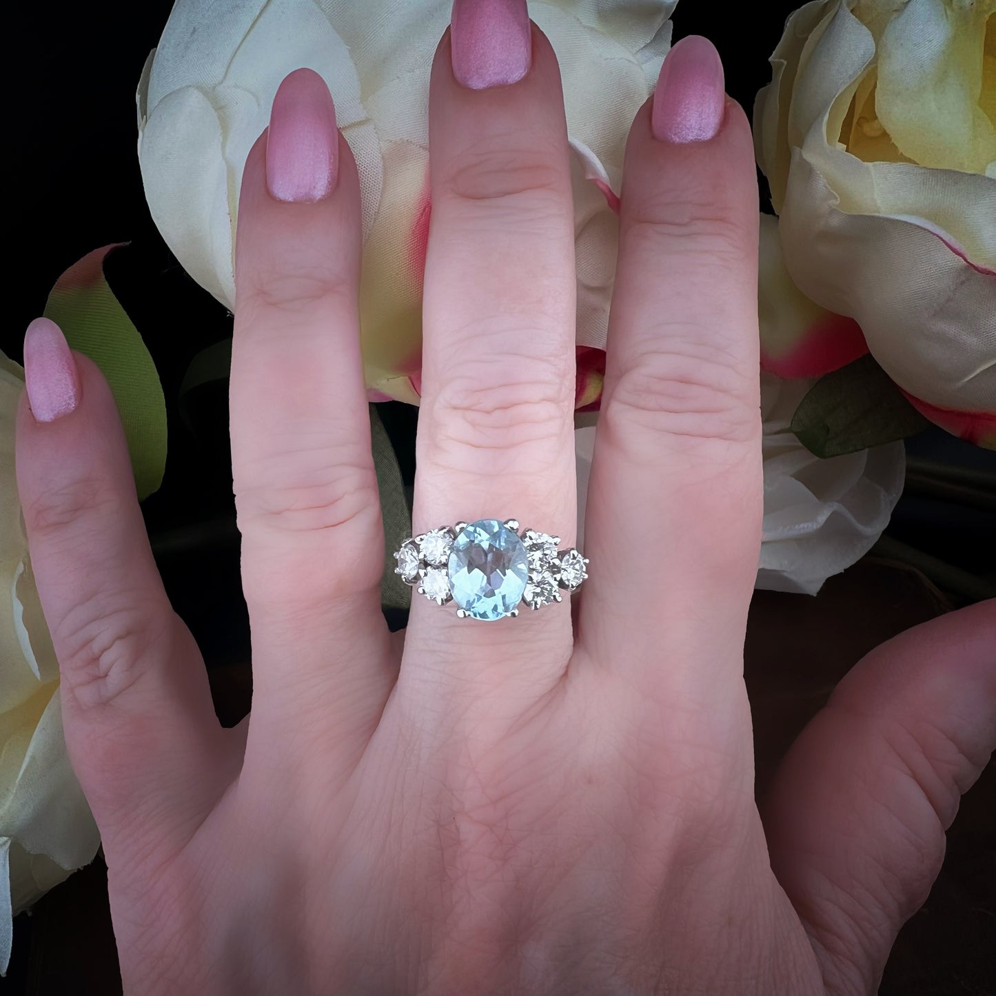 18k white gold ring with 1.20ct diamonds and 2.80ct blue topaz