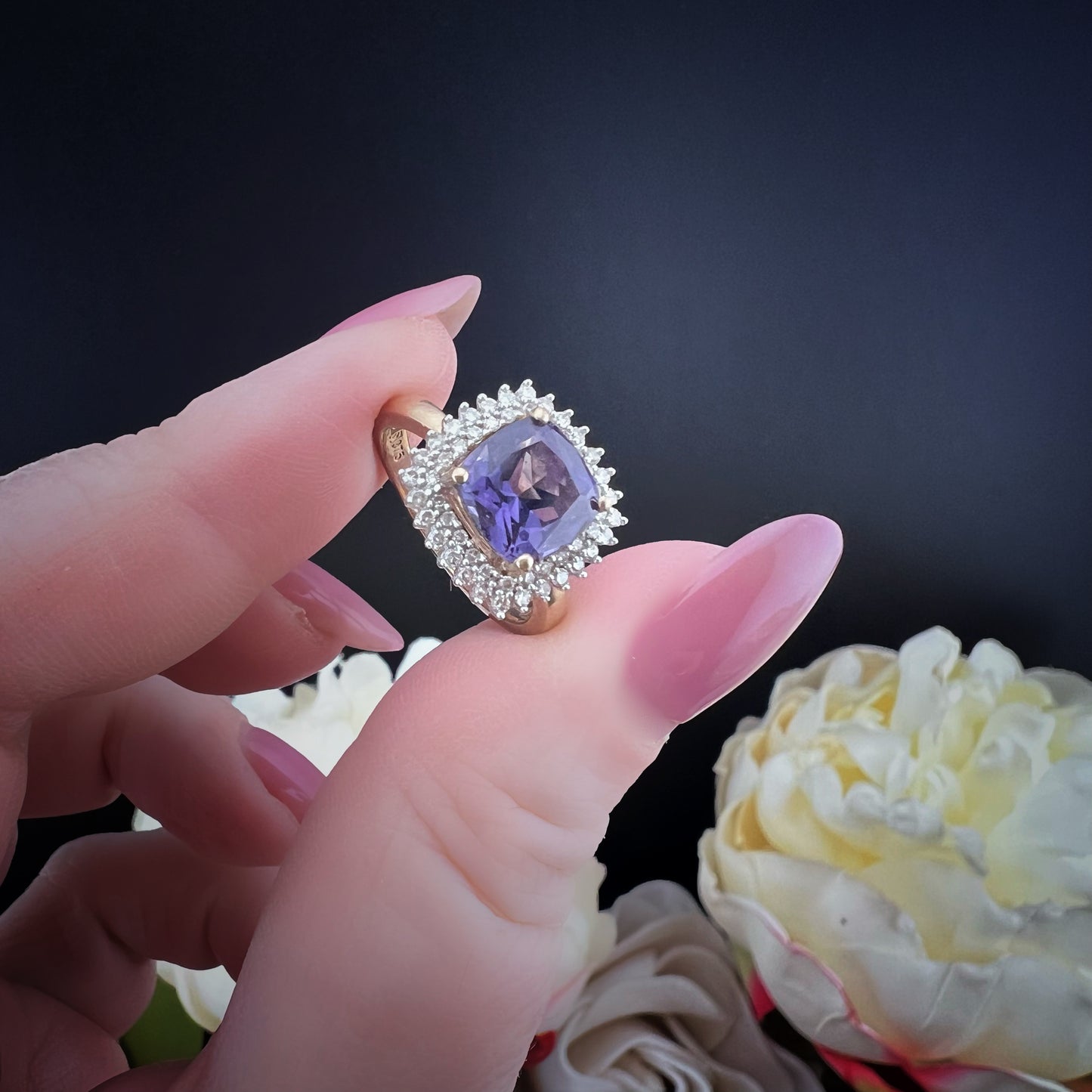 Cushion amethyst and diamond ring