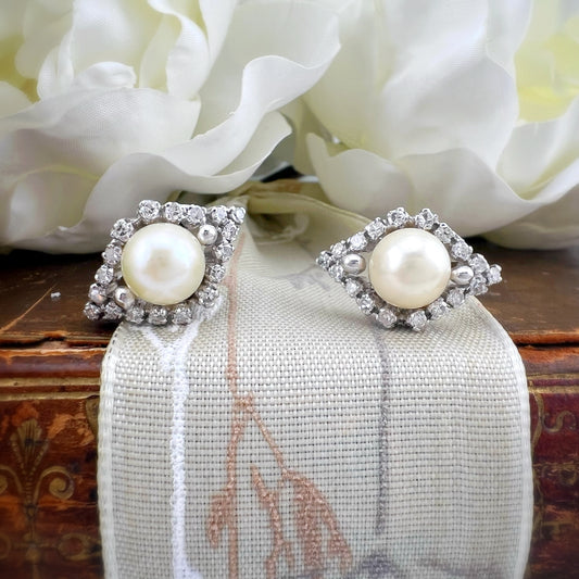 Orecchini in oro bianco 18 ct con perle e diamanti