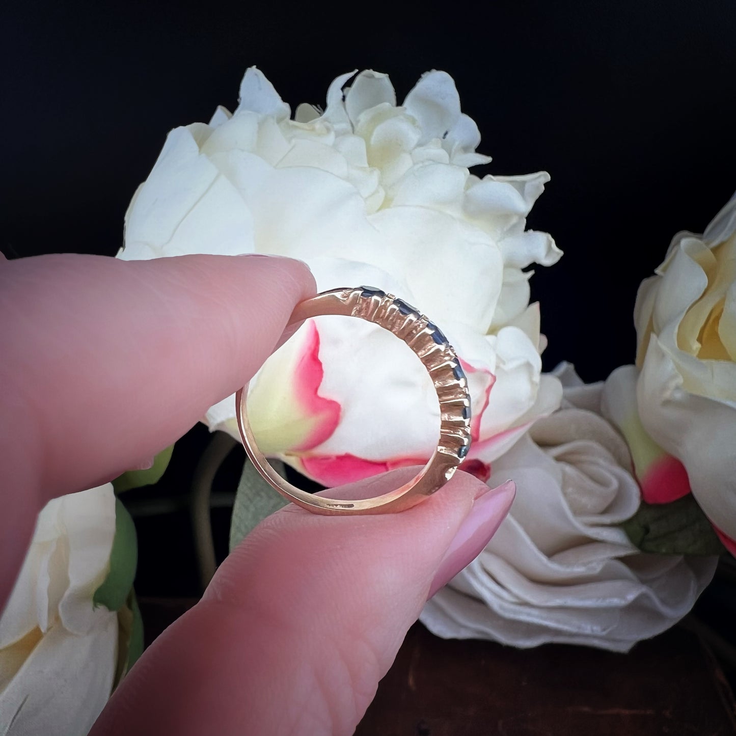 Wedding ring with 6 blue sapphires