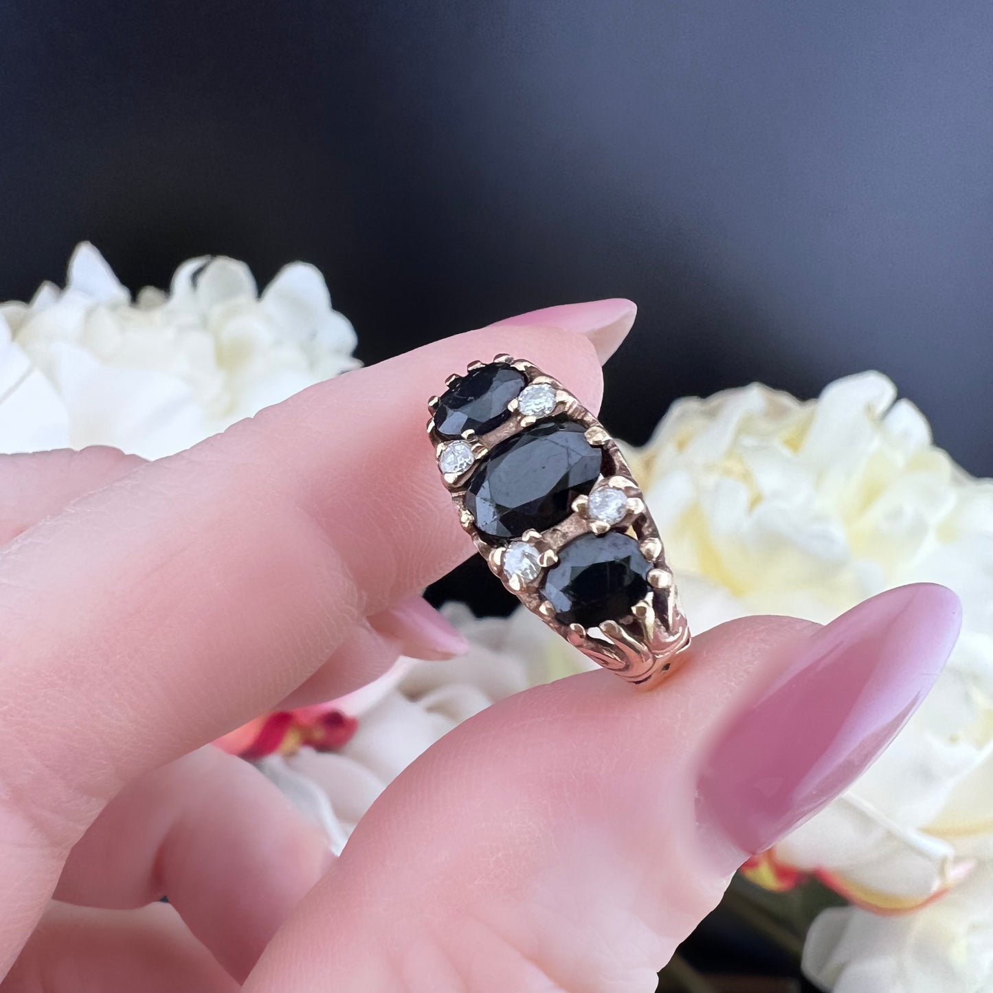 Band ring with three sapphires and diamonds