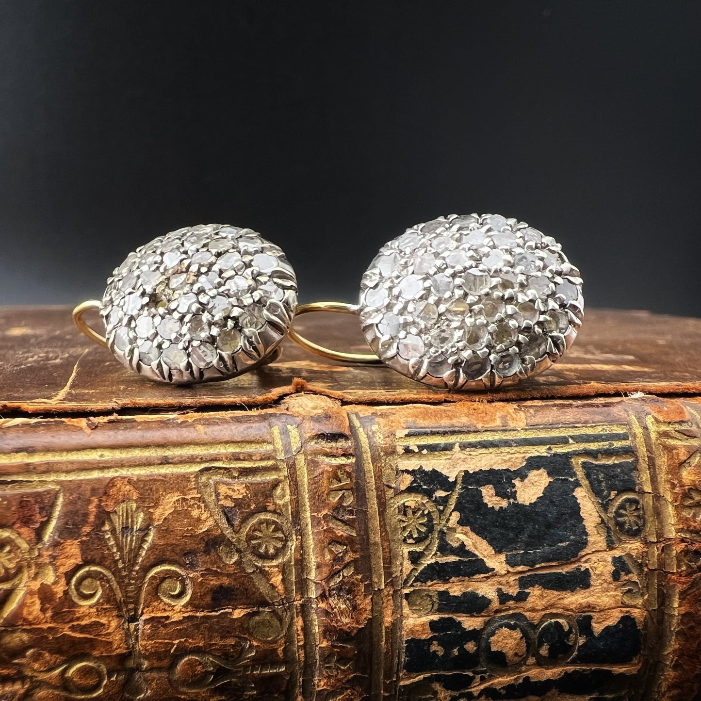 Pair of oval patch earrings, 18 ct gold, silver and diamond rosettes