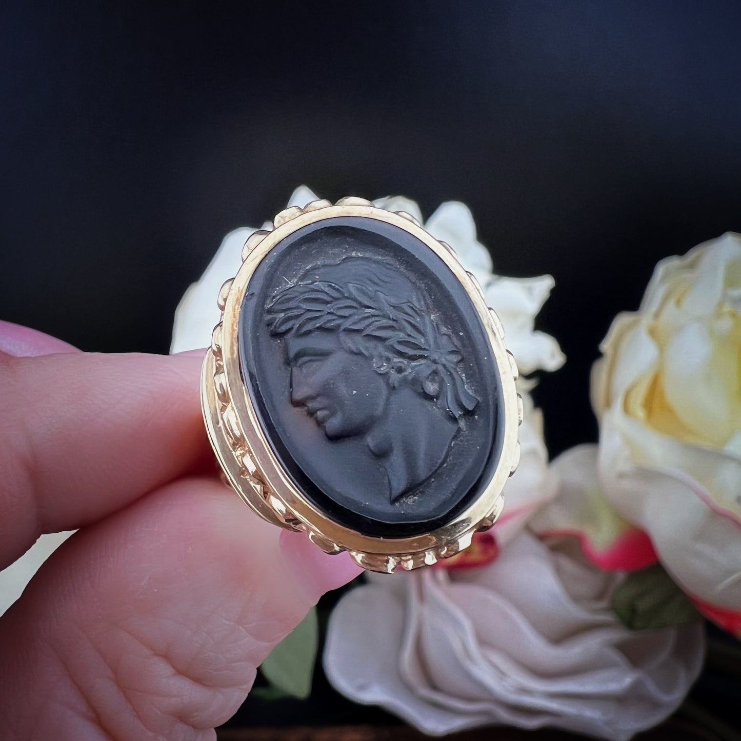 GOLD AND CARVED BASALT SIGNET RING – LONDON, 1972