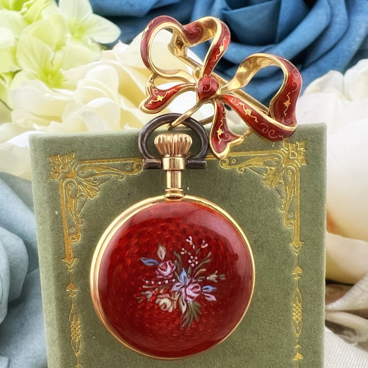 Orologino spilla (brooch watch) in oro 18 k e smalti. Italia 1950