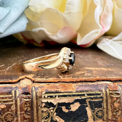 Anello con zaffiro e diamanti in oro giallo 14 ct