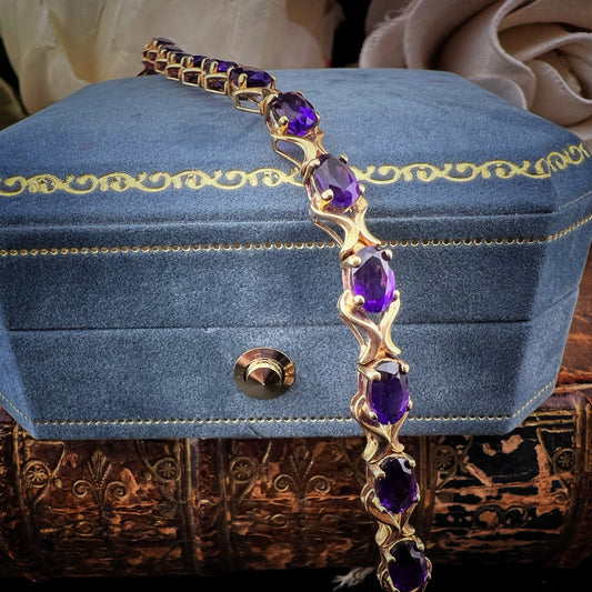 Bracciale vintage in oro giallo 9 ct con ametiste ovali