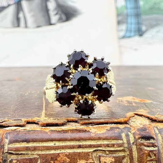 Anello vintage italiano a margherita in oro 18k con granati – circa 1965-1975