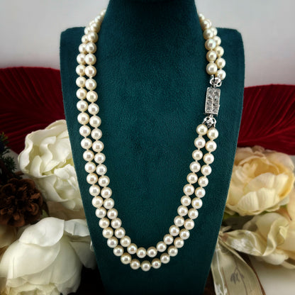 Collana a doppio filo di perle chiusura in oro bianco 18k e diamanti rosa coroné. Italia anni 20