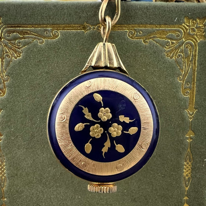 Orologino (brooch watch) in oro 18k rubini e smalti. Italia 1950-60