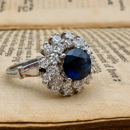 Anello vintage a margherita ovale con zaffiro e diamanti