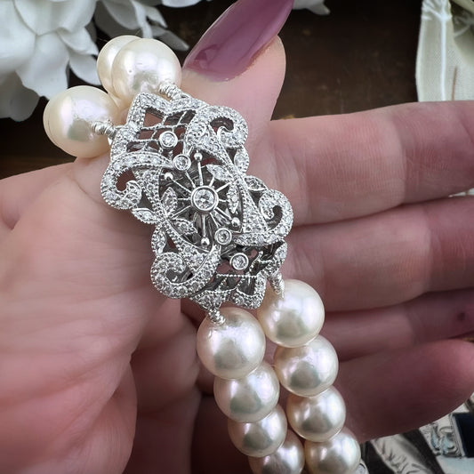 Bracciale vintage in perle Akoya con chiusura importante in oro bianco e diamanti – Anni ’60