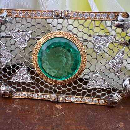 Rara e importante spilla Art Déco con smeraldo colombiano da 7 carati